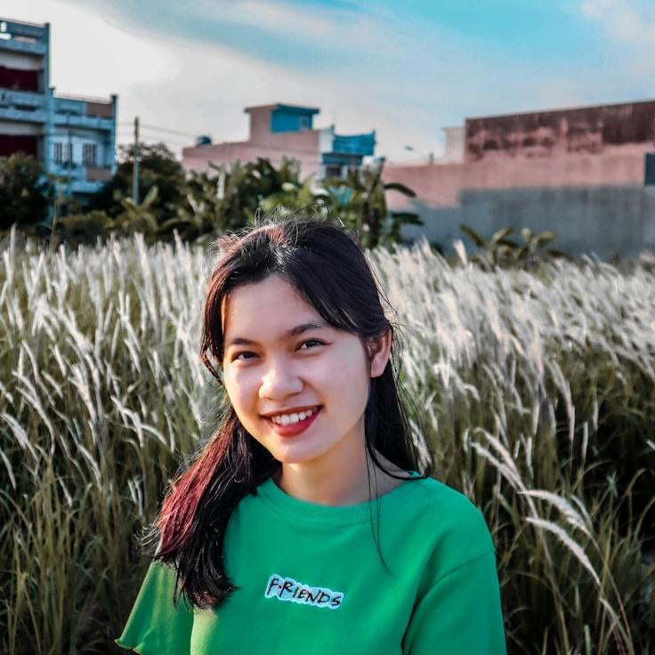 Kaveri Mehta, Lead Design Curator at Market Azure Packet, reviewing corporate floral arrangements